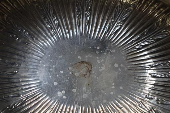 A late Victorian embossed silver two-handled shaped oval bowl, London, 1900, 18.5 oz.